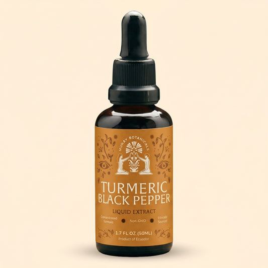 Bottle of Munay Botanicals Turmeric & Black Pepper tincture on a light background.